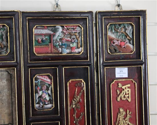 A Chinese 12 panel polychrome and gilt wood screen, 19th century, 274cm x 118cm, hinges removed for hanging